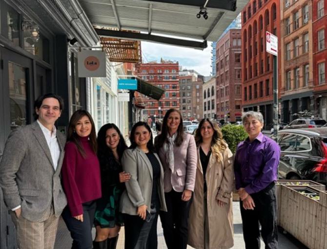 UC Davis students and Joe Chen standing on a sidewalk in NYC