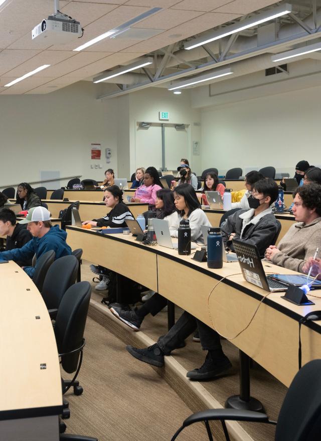 Students in a classroom, Paul Wong teaching