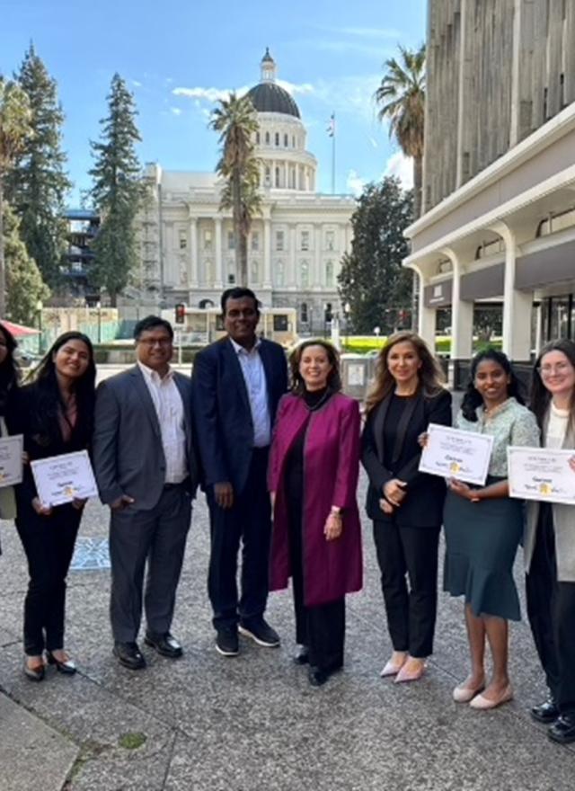 MSBA students holding up certificates in in front of Sacramento capitol