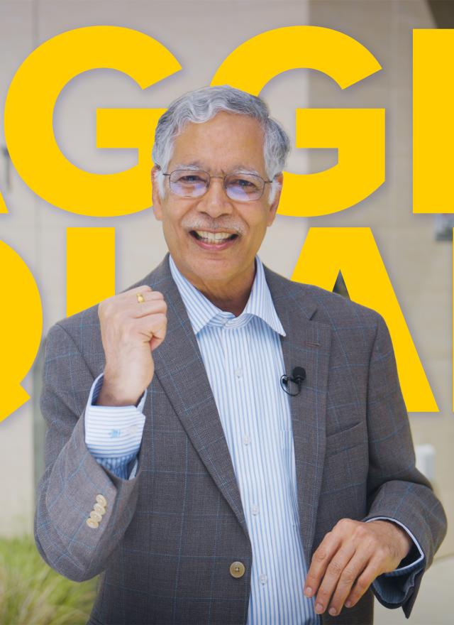 Rao Unnava standing in front of Gallagher Hall
