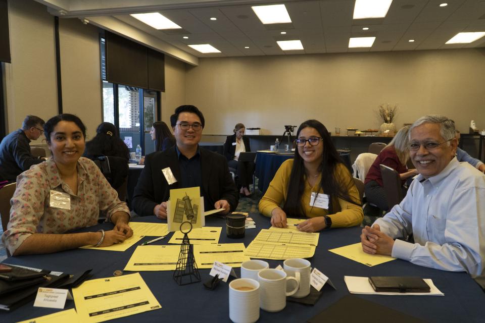 MBA students Teghpreet Ahluwalia Kevin Chuc, Fernanda Villegas and Dean H. Rao Unnava at the Collaborative Leadership Retreat