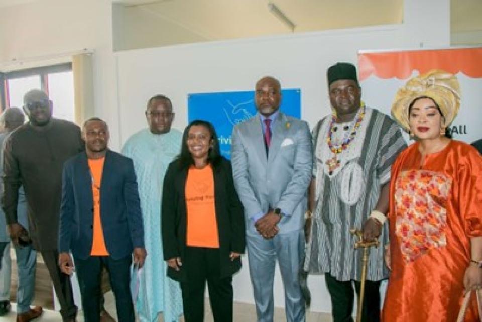 Genevieve Ngambia with a group of people at the opening of her nonprofit in Cameroon