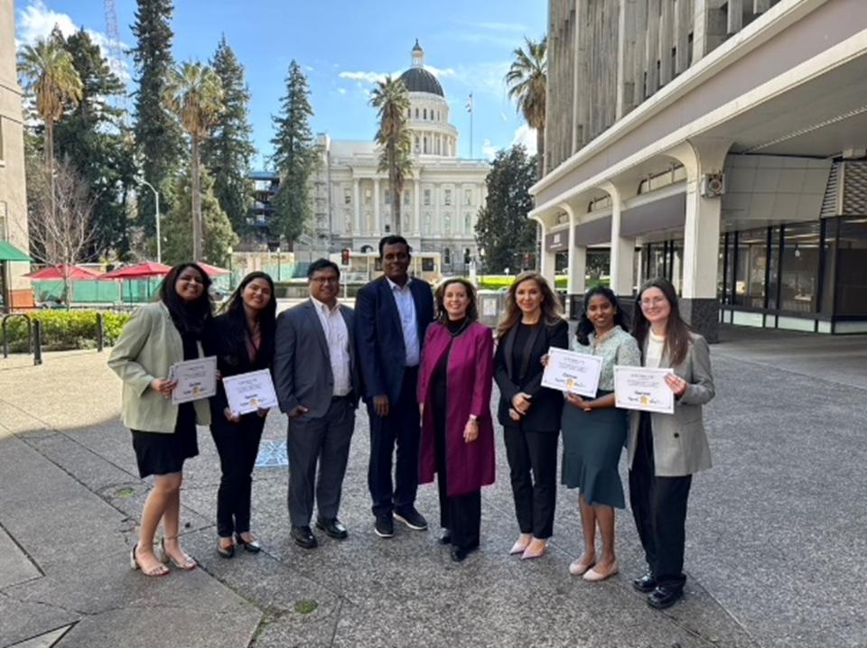 MSBA students holding up certificates in in front of Sacramento capitol