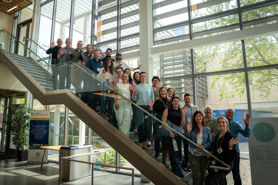 Wine Executive Program participants on the staircase in Gallagher Hall