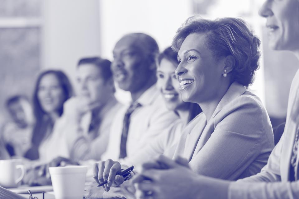 Group of people at a conference table